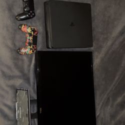 PS4 Slim With Monitor 2 Controllers And 2 Games