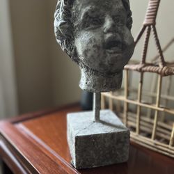 The Concrete Head Statue 