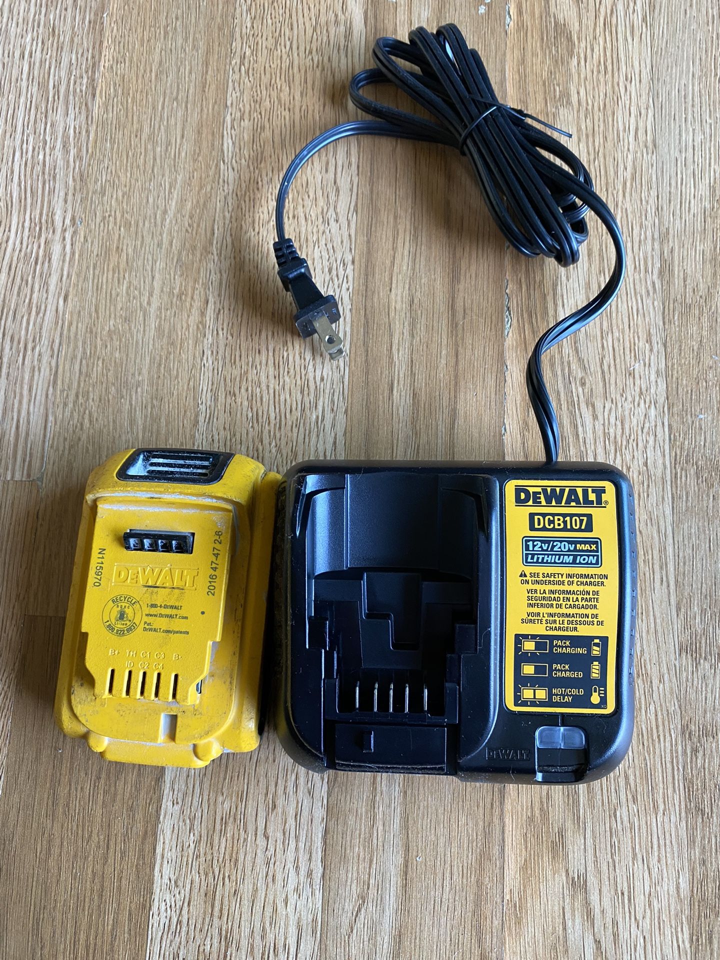 The charger is new and the battery is used.$25
