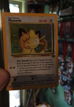 Pokemon promo card 10 meowth