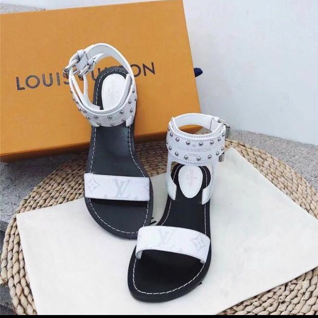 Louis Vuitton flat bottom high boots black brown or white
