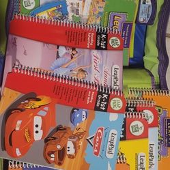 Leap Frog collection of LeapPad educational books and a LeapPad learning system
