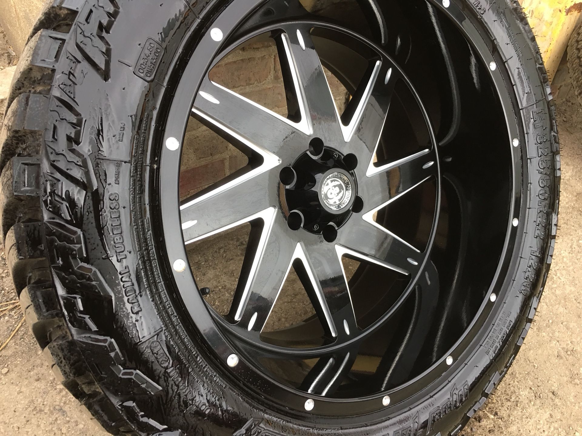 22x12 wheels and 35” amp mud tires 6 Lug 22” Rims