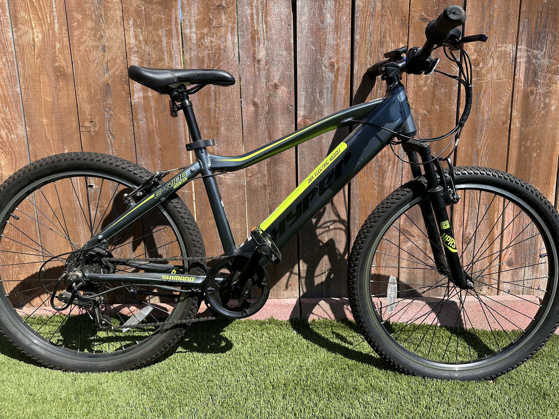 Hyper Bicycles E-Ride 26 inch Mt bicycle 36V Electric Mountain E-Bike for Adults, Pedal-Assist, Grey/Neon Green color. Shimano components.