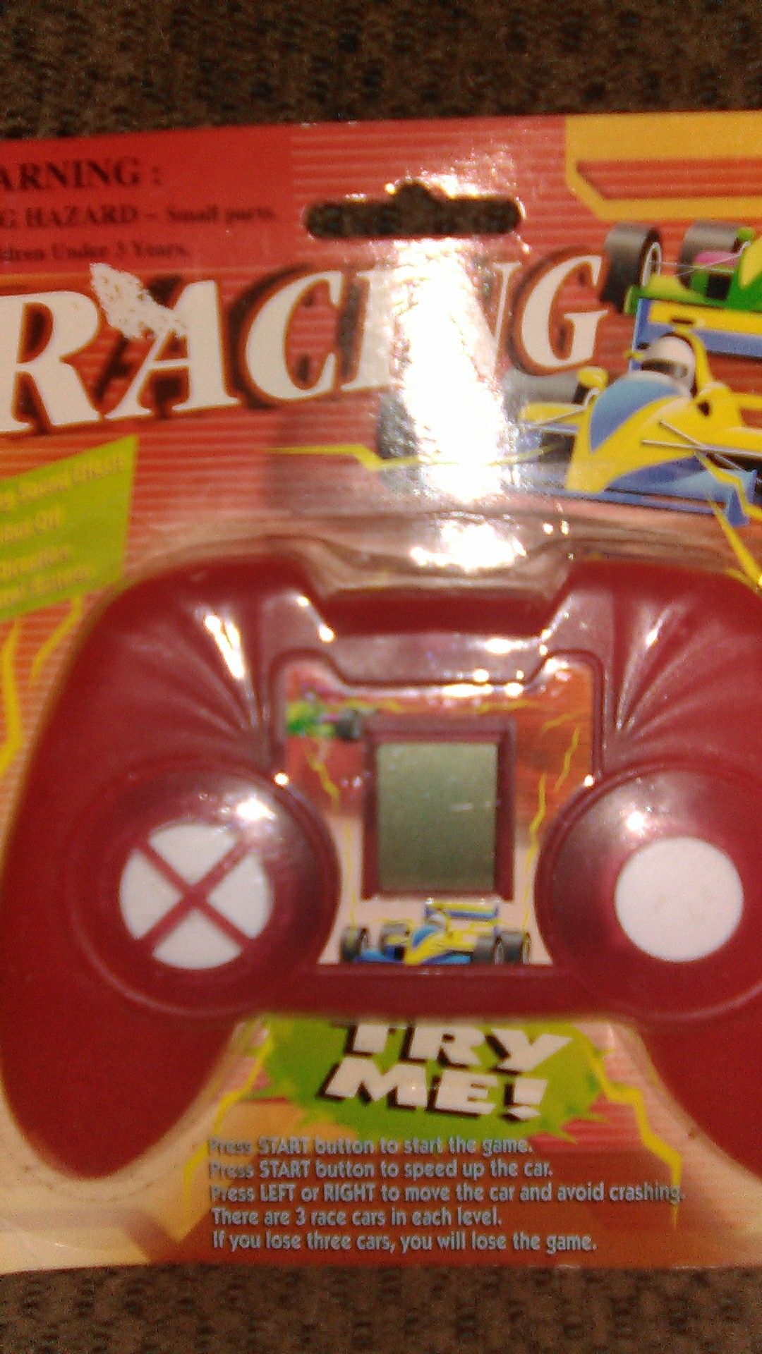 Race car handheld game