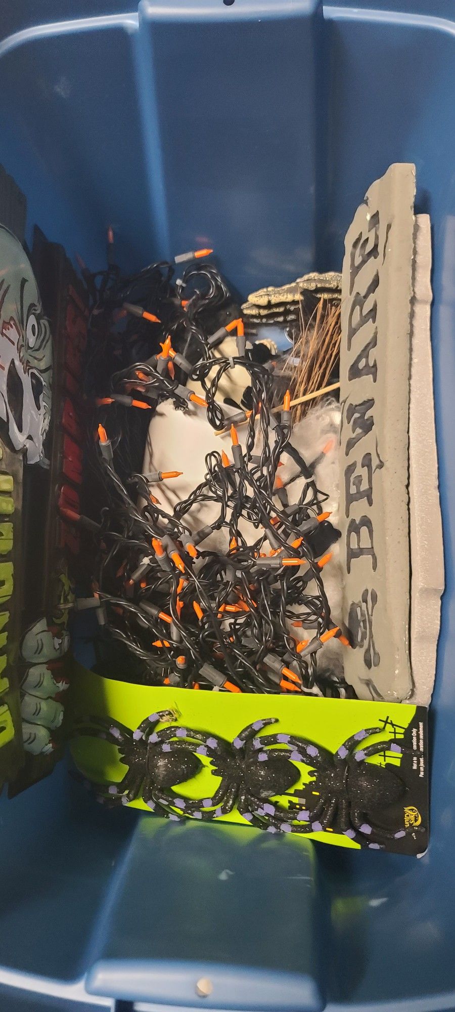 Tub full of random Halloween Decorations.