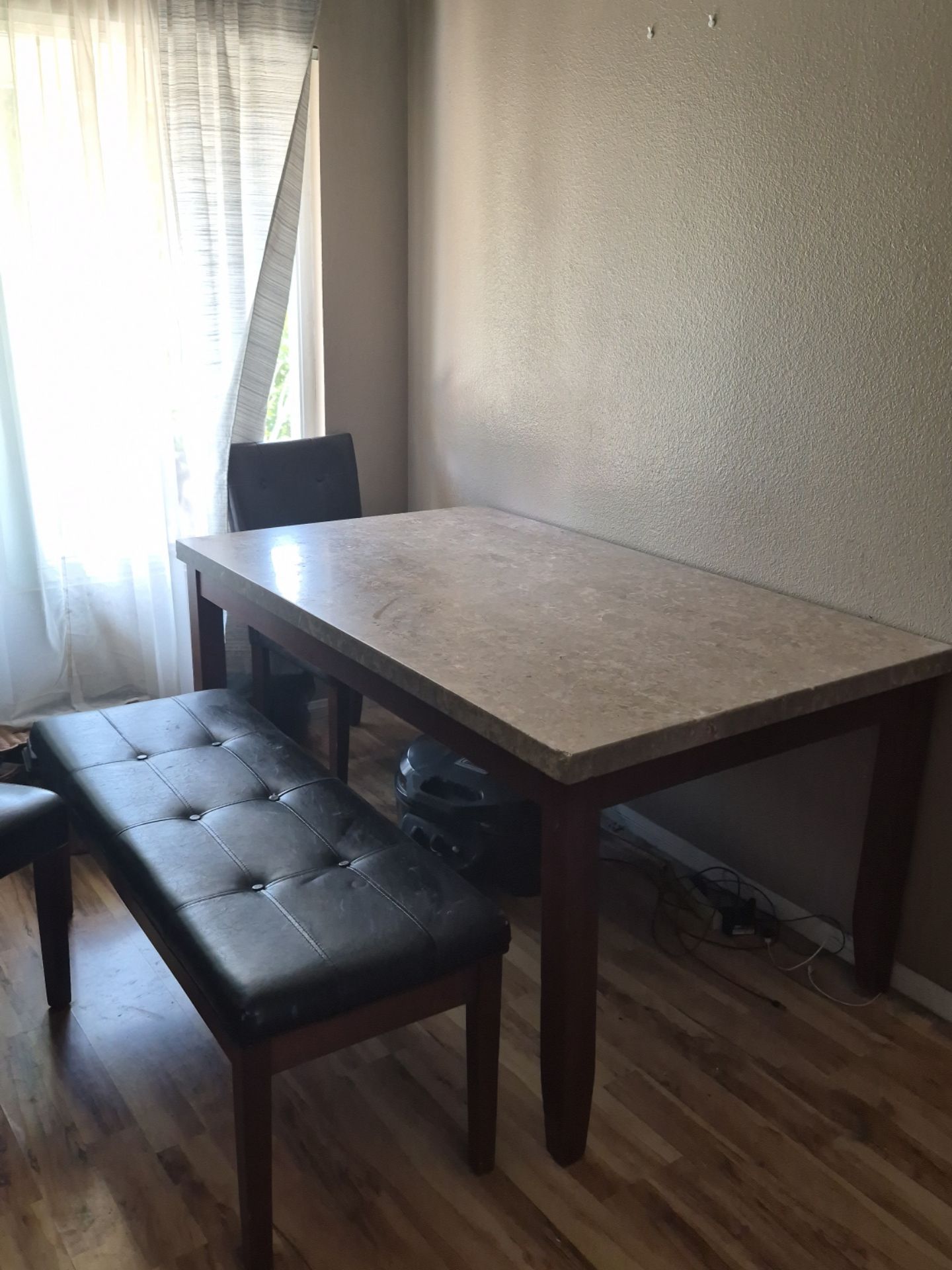 Marble top dining table with solid wood legs