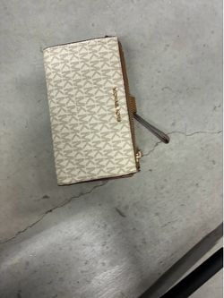Jet set travel large logo continental wristlet