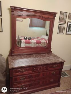 Beautiful dresser, granite top , mirror
