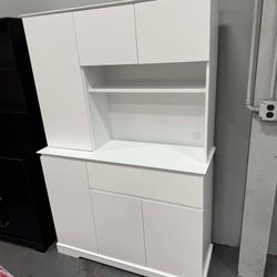 New in box 71" Tall  white kitchen storage cabinet with 6 doors and 1 drawer. Freestanding storage unit with countertop shelves, suitable for dining r