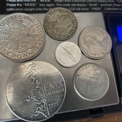 Canada, UK, Finland, Australia 50% silver coin lot. 57.6 grams, 28.8 ASW.