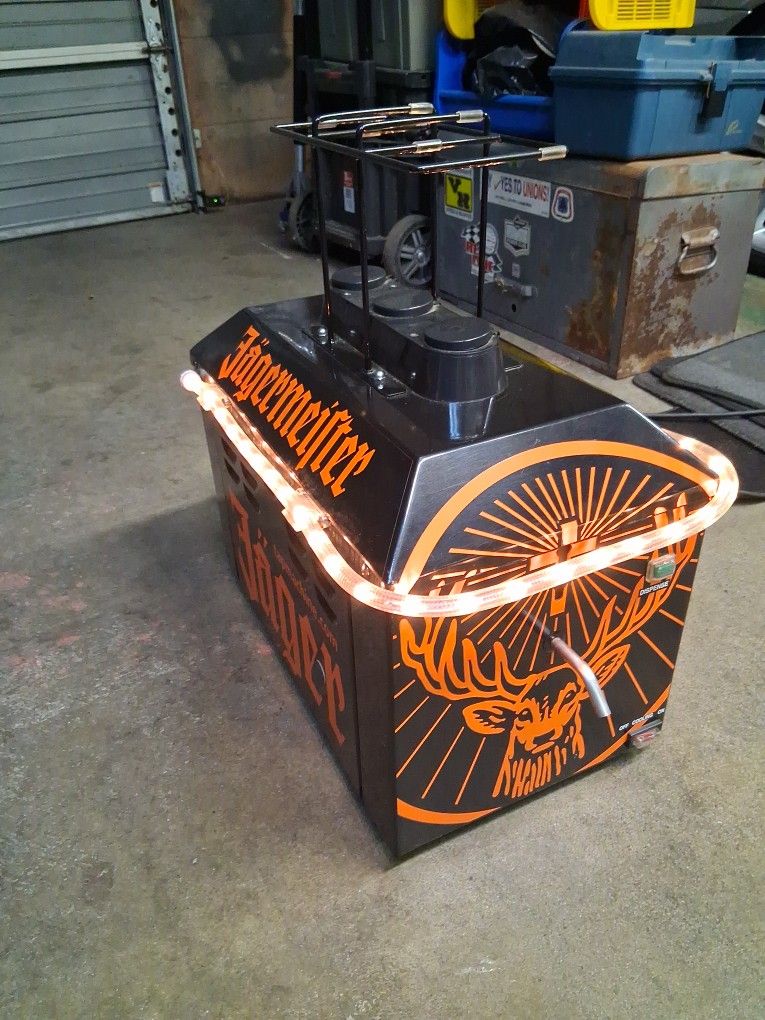 Jaegermeister dispensing machine 3 bottle capacity with lights in perfect working condition.
