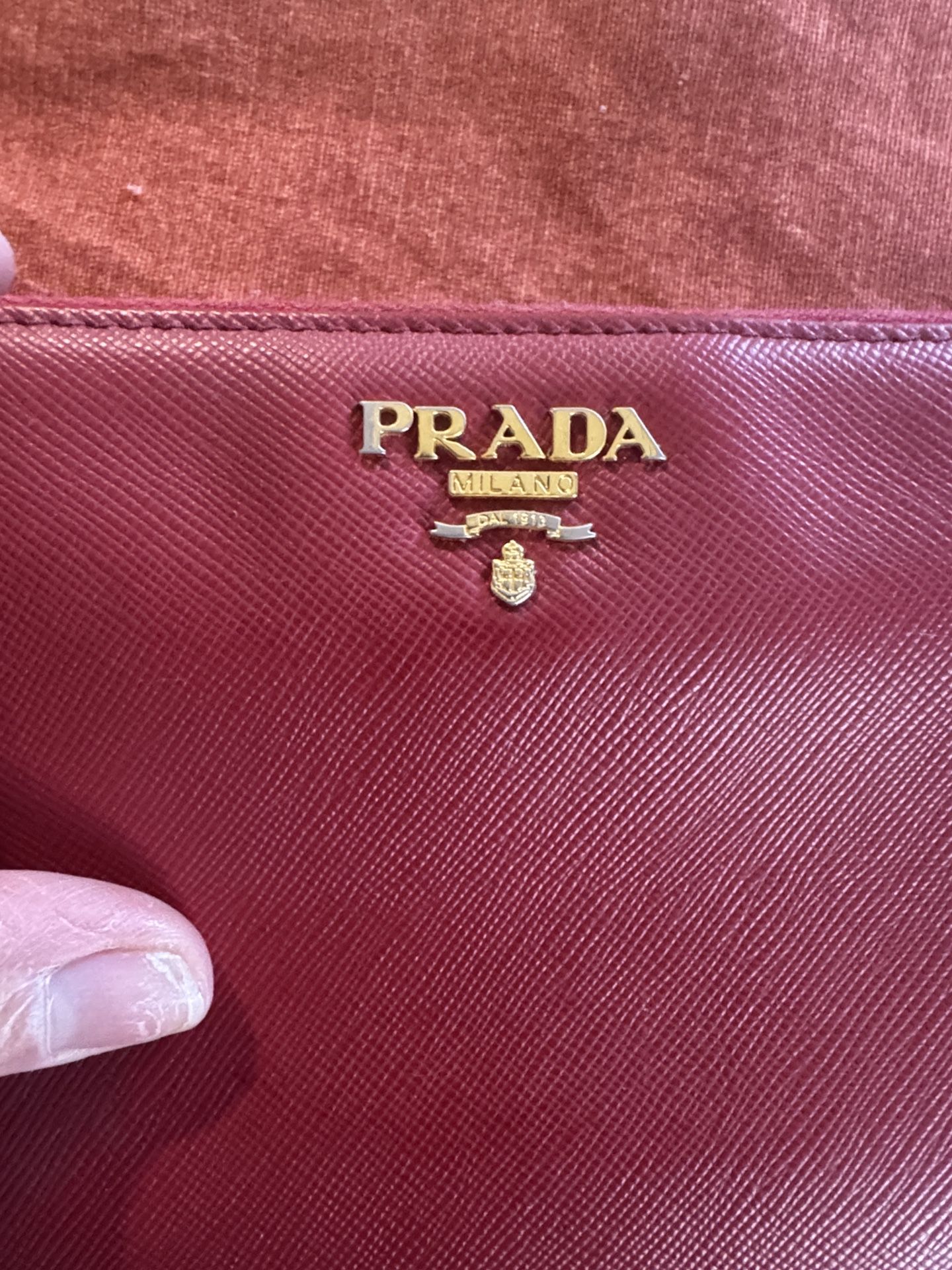 Authentic Red Prada Zippie Leather 