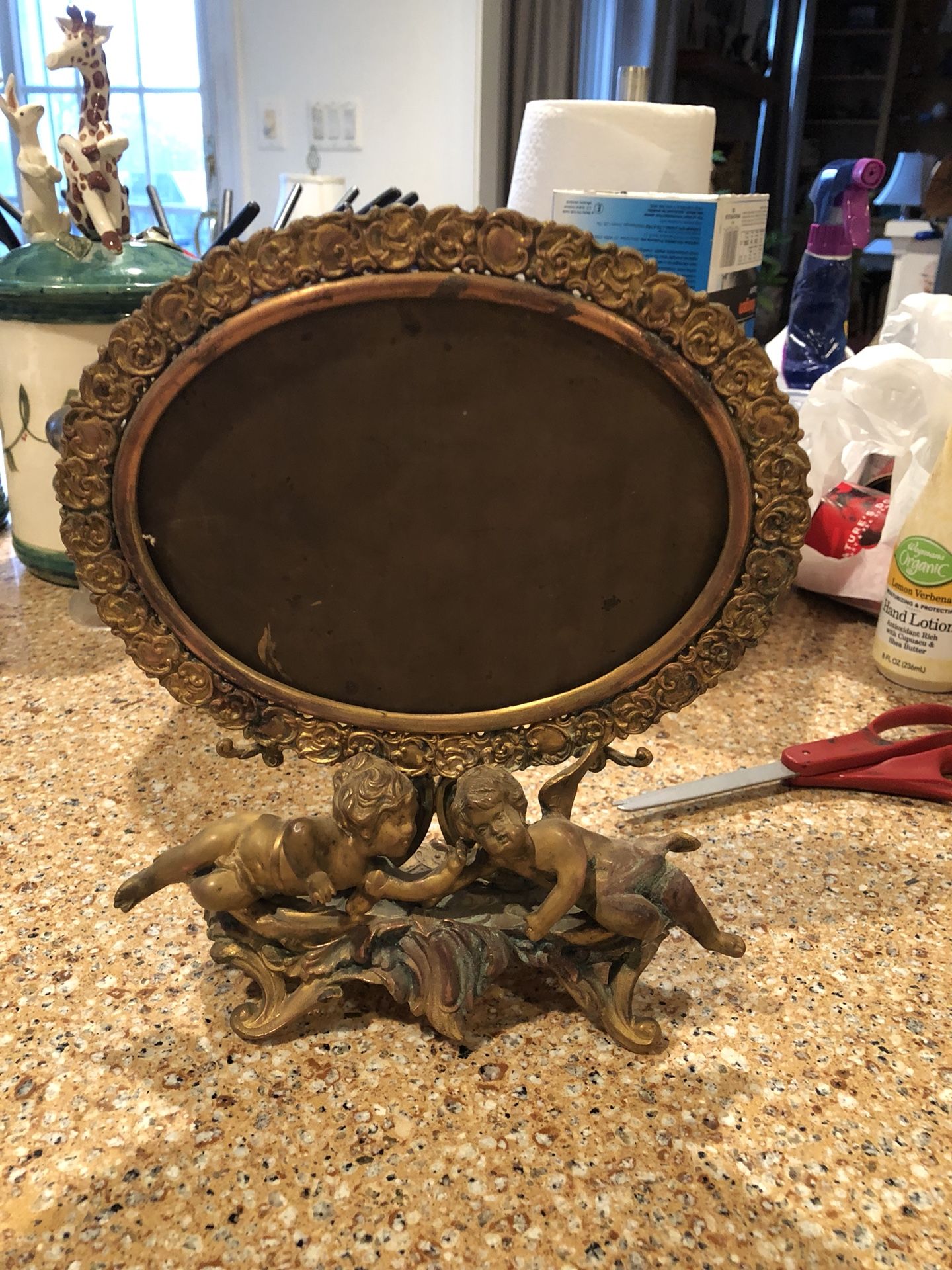 Antique oval brass picture frame