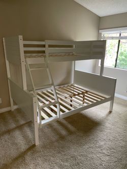 Twin/full bunk bed. Available in black & white. Assembly required. Assembly not included. Tax included. Free local delivery. $350 bunk bed only. $550 