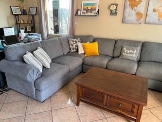 Large and super comfortable Grey Sectional Couch from Jerome’s