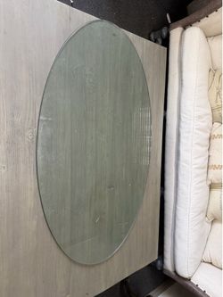 Oval Glass top.