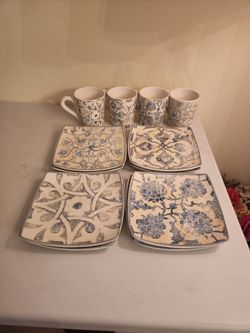 Blue and white plates and mugs set