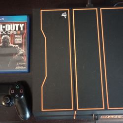 PS4 with Call of Duty Black Ops 3 & a controller.