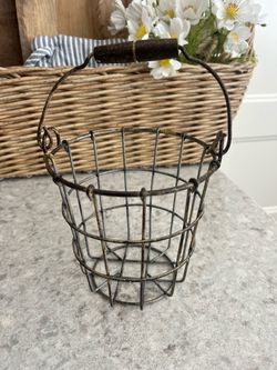 Metal basket with wood handle $5