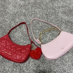 Red purse and pink purse hand bags