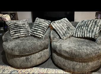 Grey oversized swivel chairs