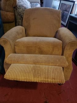 Less than a year old Lang recliner very comfortable Not a rocker paid 899 will take 200obo
