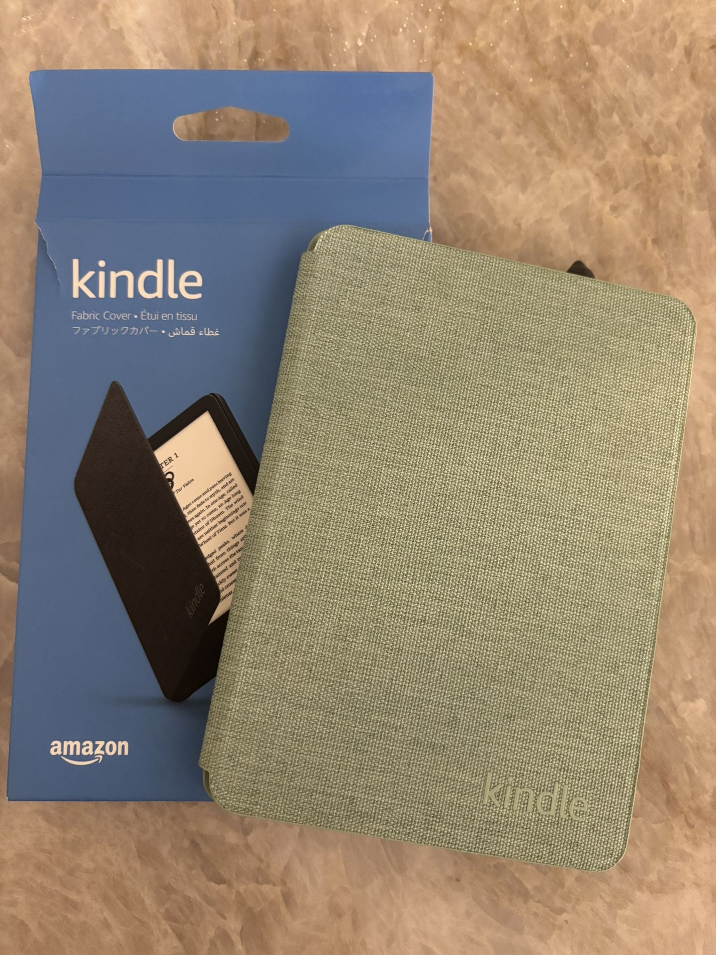 Kindle fabric cover. This is for the cover only and not the kindle device itself :)