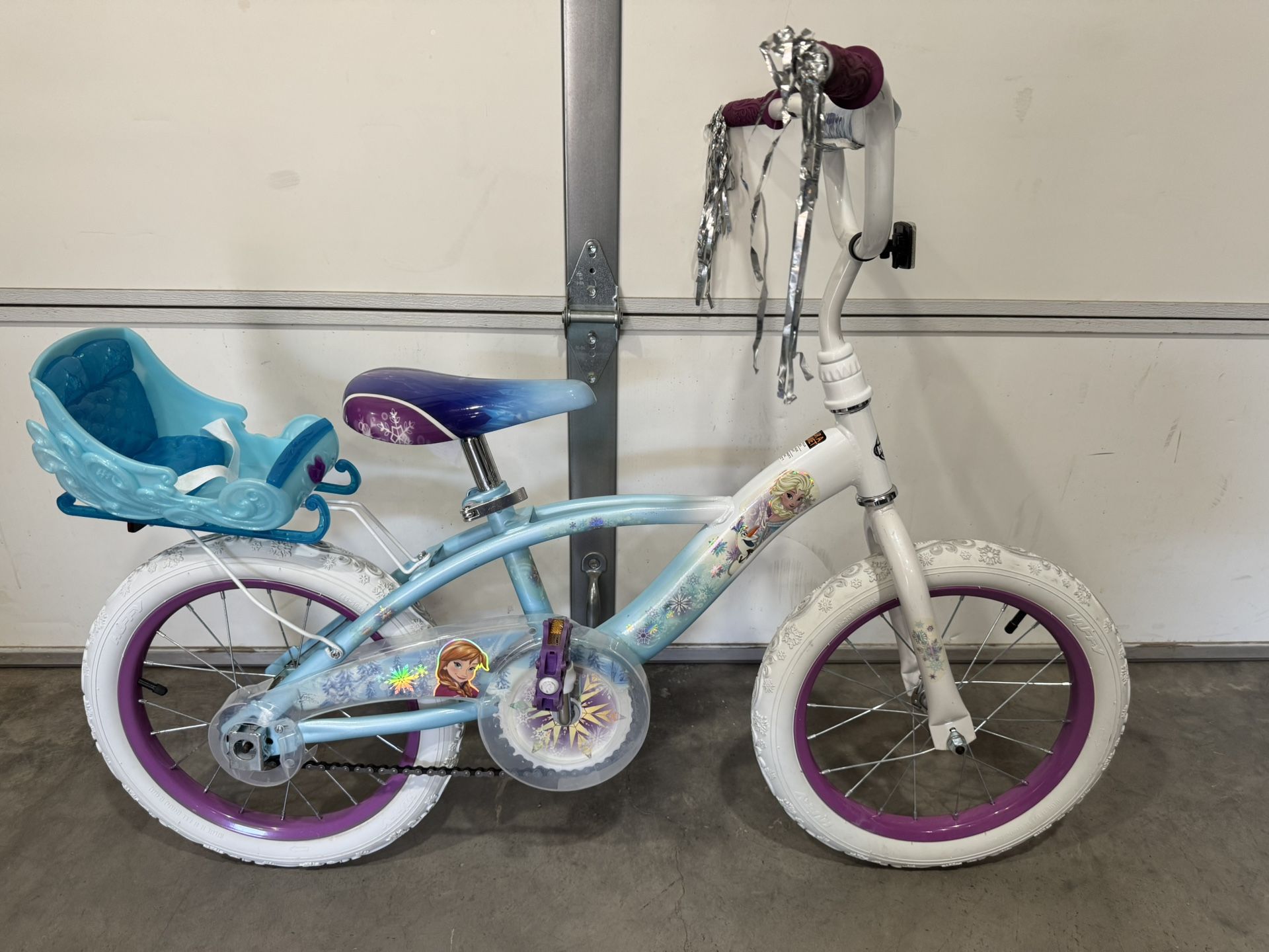Huffy 16” Girls bike. Frozen theme. -35ave & Glendale