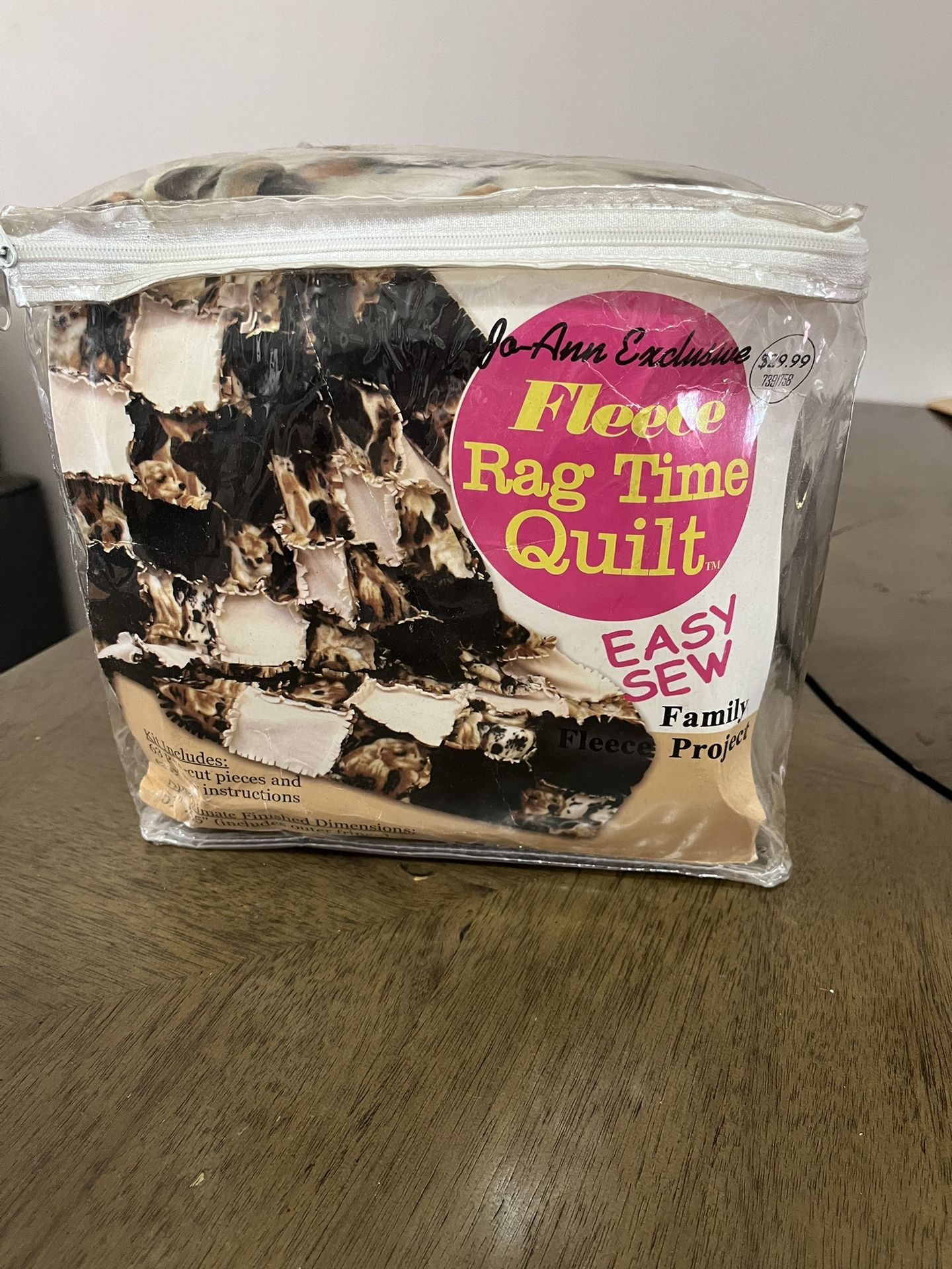 A ragtime fleece quilt puppy dog by Jo-Ann