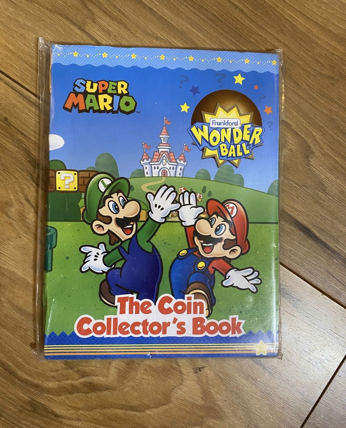 SUPER MARIO Frankford Wonder Ball Coin Collector's Book NEW SEALED
