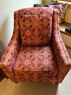 Chair, red orange in color