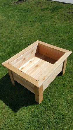 Brand new cedar raised planter box.