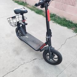 Scooter electric bike with seat for kids is used but work 100% is only for kids won't handle big person only 200lb or less to pull 18mph to 25miles ra