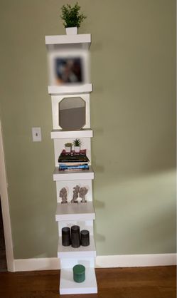 Two white 7-Tier standing shelves
