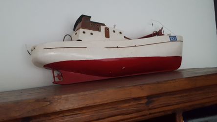 Wood sailboat decor needs repair