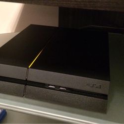 PS4 with 2 Controllers and 5 games