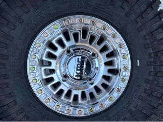 32x10x15.  MAXXIS.  AND KMC.  TRUE BEADLOCK.