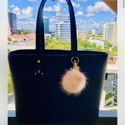 H&M Brand new Black Tote bag solid Tote with zip at the top. Three  Inside pockets ,one with zip   Beautiful pompom keychain color pink !   Approximat