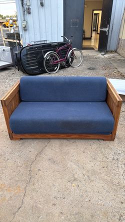 Wood Frame Loveseat with Blue Cushions