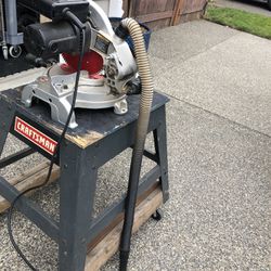 10 inch Laser Miter Saw in good working condition with a fairly new blade.