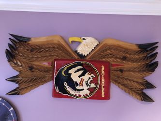 Carving wood Florida State college team