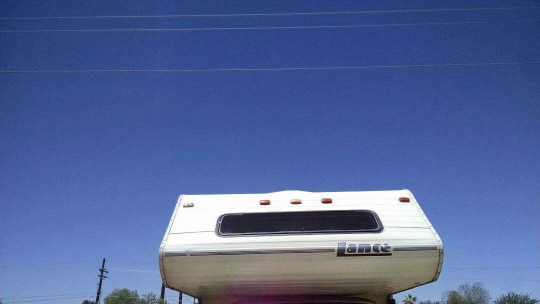 92 Lance squire ls4000 9.4 ft self contained cabover camper
