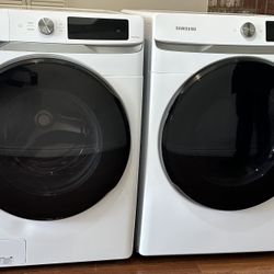 White Samsung washing machine with Samsung dryer for sale. 7 cu