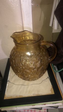 Old amber glass pitcher