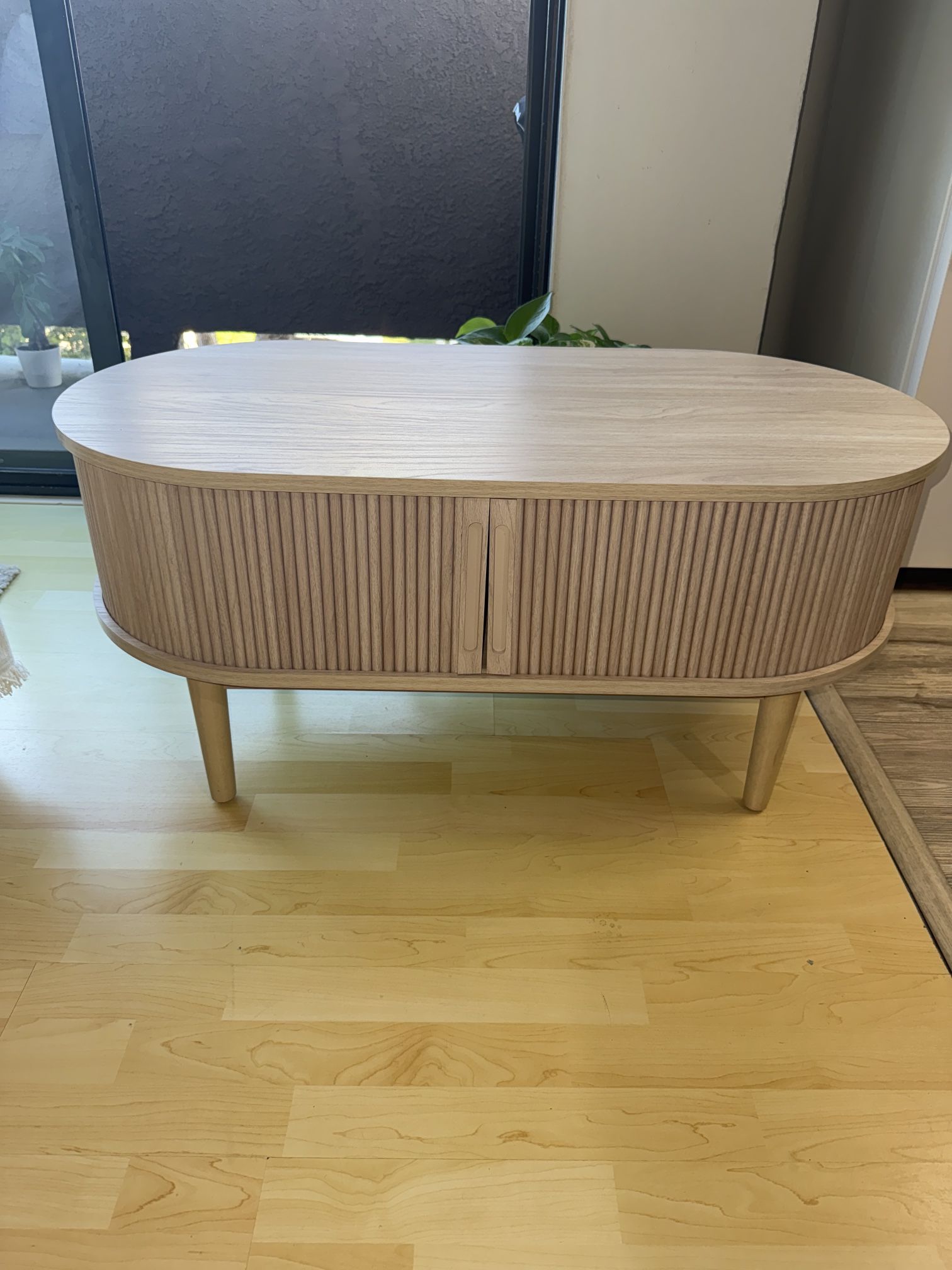 LINSY HOME Oval Coffee Table, Wood Coffee Table with Storage, Fluted Accent Center Table with Sliding Tambour Door, 39" Boho Coffee Tables for Living