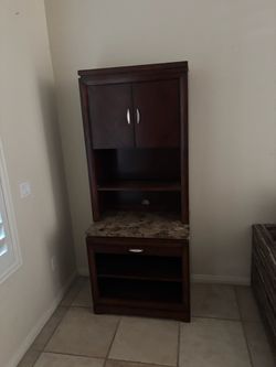 Dark Wood Cabinet with Marble-Top Base