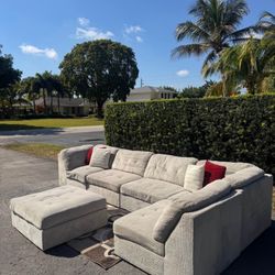 Beige Multi Piece Sectional Sofa w/ Ottoman(Delivery Available)