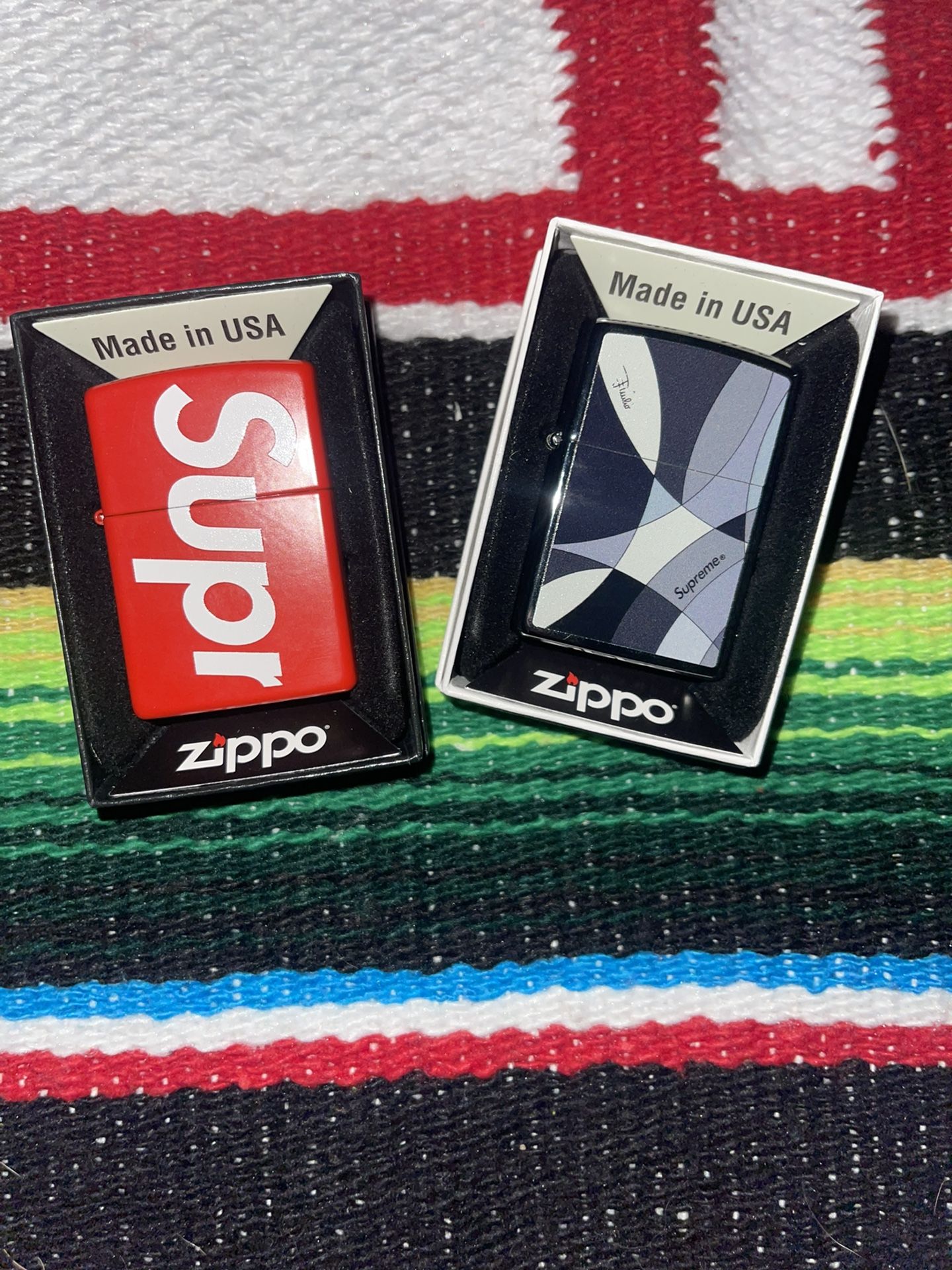 Supreme Zippos 