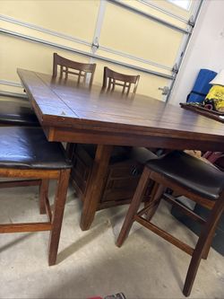 High top table with 6 chairs